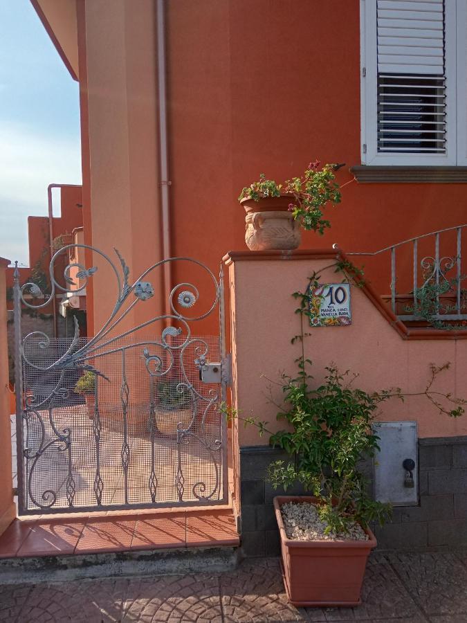 Casa Vacanza Le 2 Isole Suni ภายนอก รูปภาพ