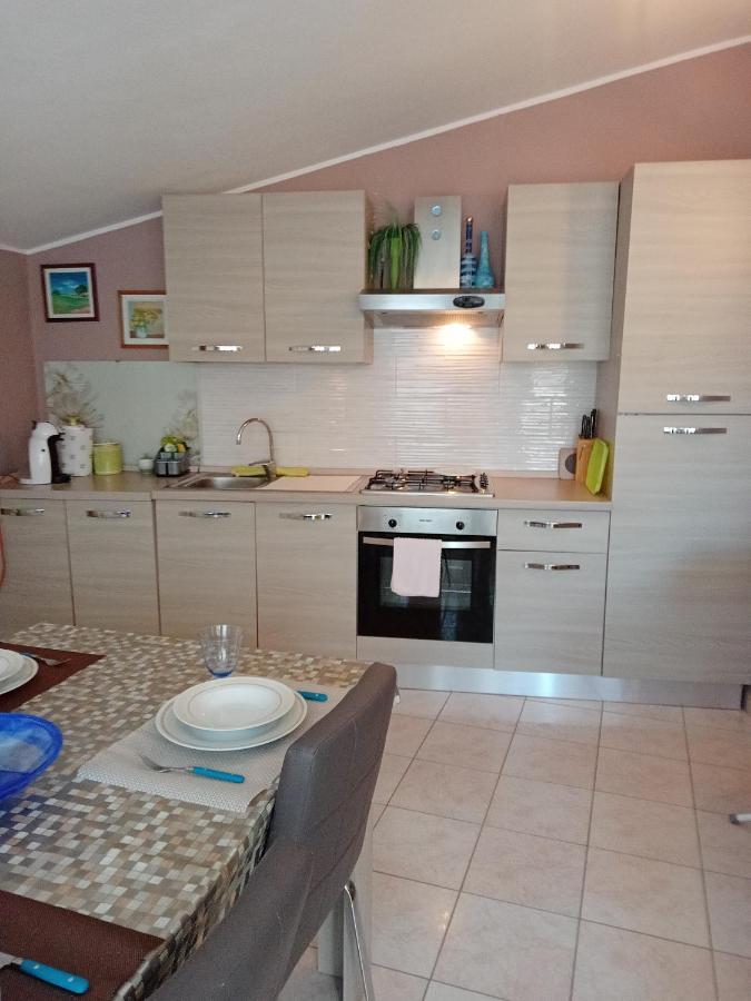 Casa Vacanza Le 2 Isole Suni ภายนอก รูปภาพ