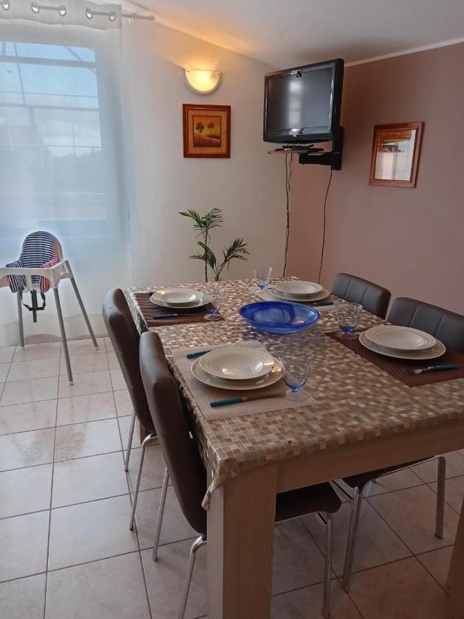 Casa Vacanza Le 2 Isole Suni ภายนอก รูปภาพ